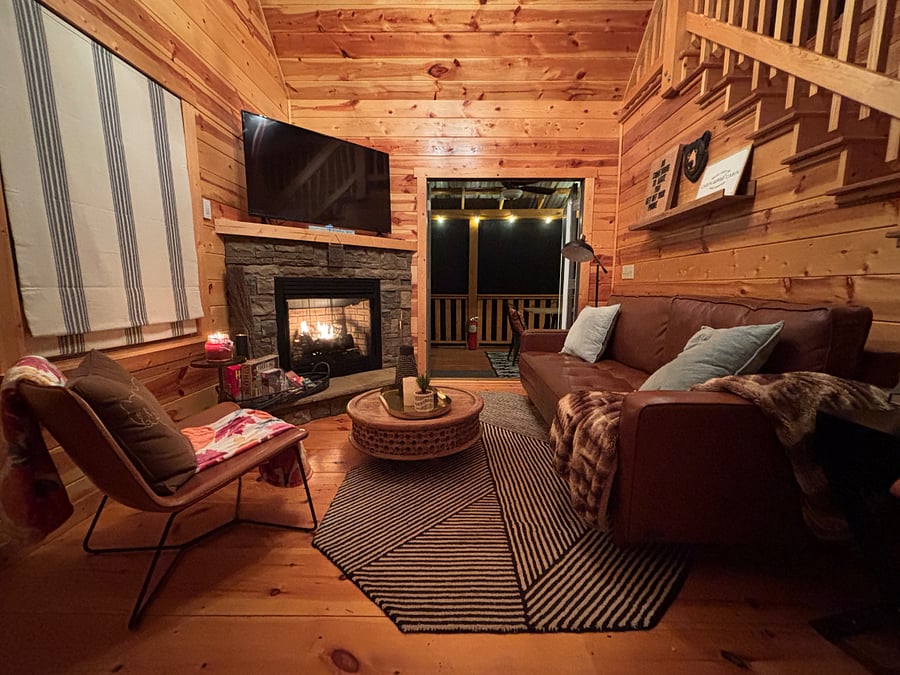 Comfortable living room with fireplace and Smart TV - perfect for cozy nights.
