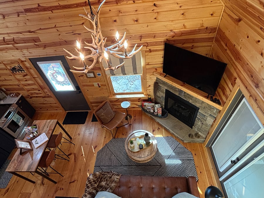 Cozy living room ~ relax by the fire, watch TV, or step outside to the patio.
