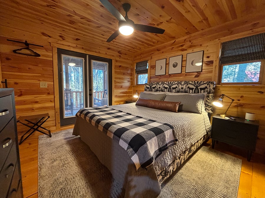 Serene king bedroom w/ patio access, smart TV, and a luxurious Nectar mattress.