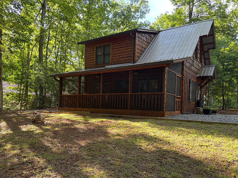 View of back patio facing backyard.