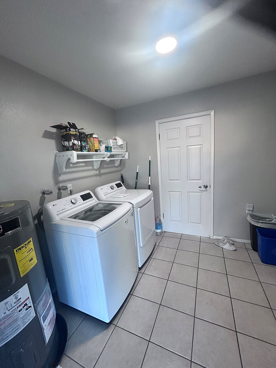 LAUNDRY ROOM AND NEW WATER HEATER 