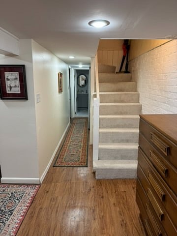 These stairs lead to the second floor, where you'll find the kitchen, living room, dining room and outdoor spaces. 