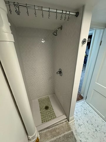 Rest assured, there will be a shower curtain! I'm having it hemmed to fit. :)