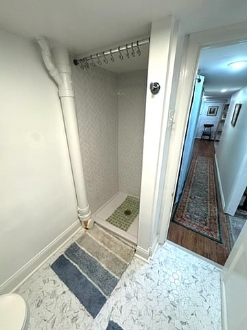 Rest assured, there will be a shower curtain! I'm having it hemmed to fit. :)