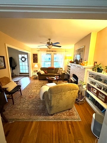 The living room has a working wood fireplace. :)