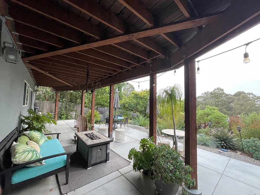 one of many seating areas in back yard oasis