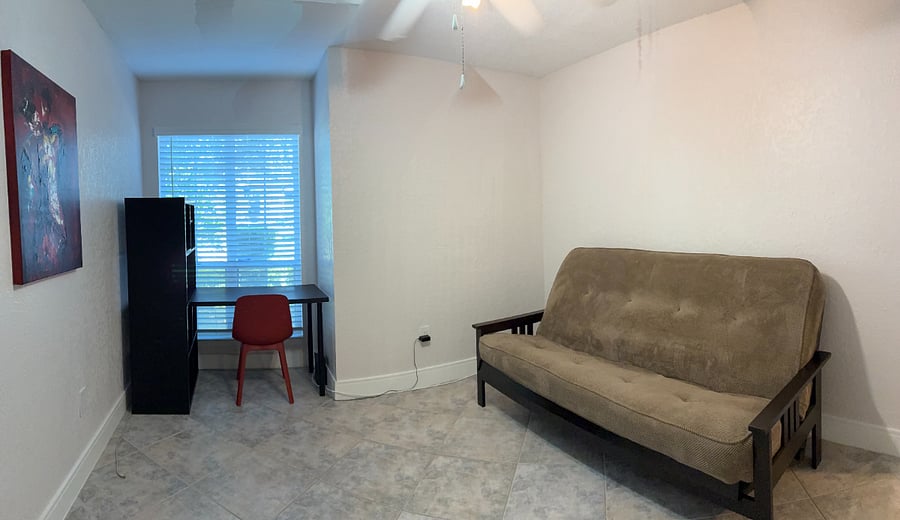 Futon sofa opens to a "Full Size" bed. This room could be a Bedroom or a Work/Study room.