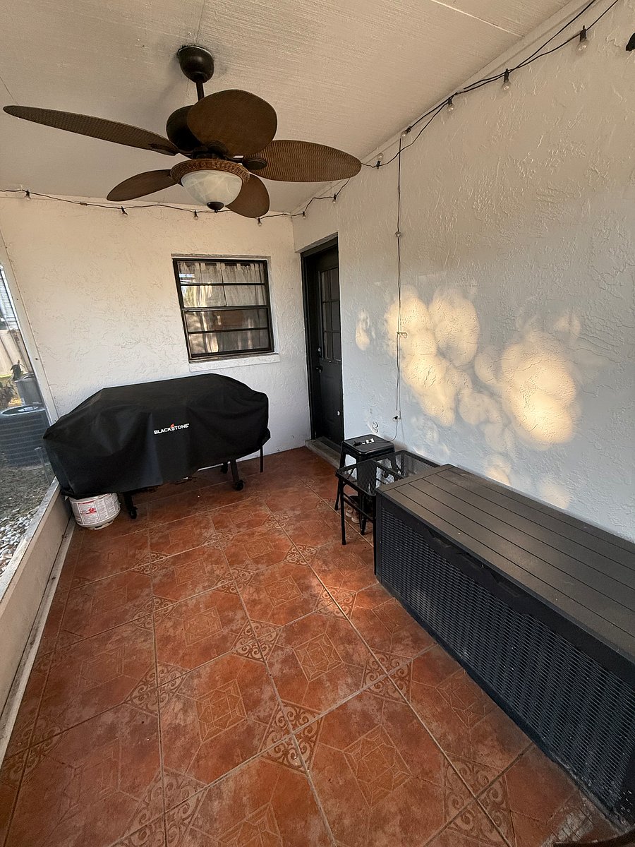 Private screened lanai with black stone griddle. Perfect for relaxing and making dinner