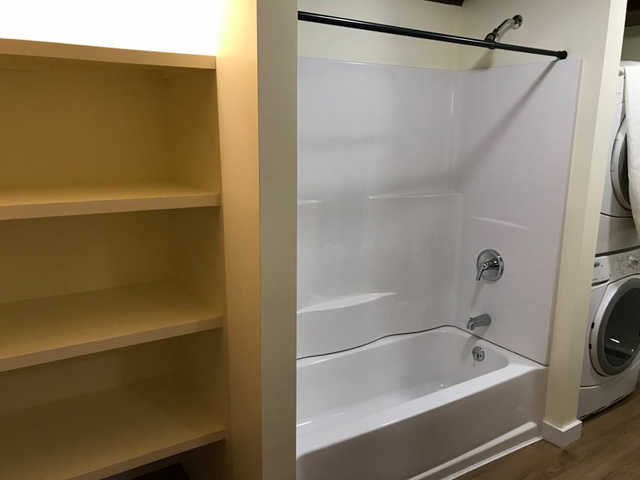 Large bathroom w/washer dryer.