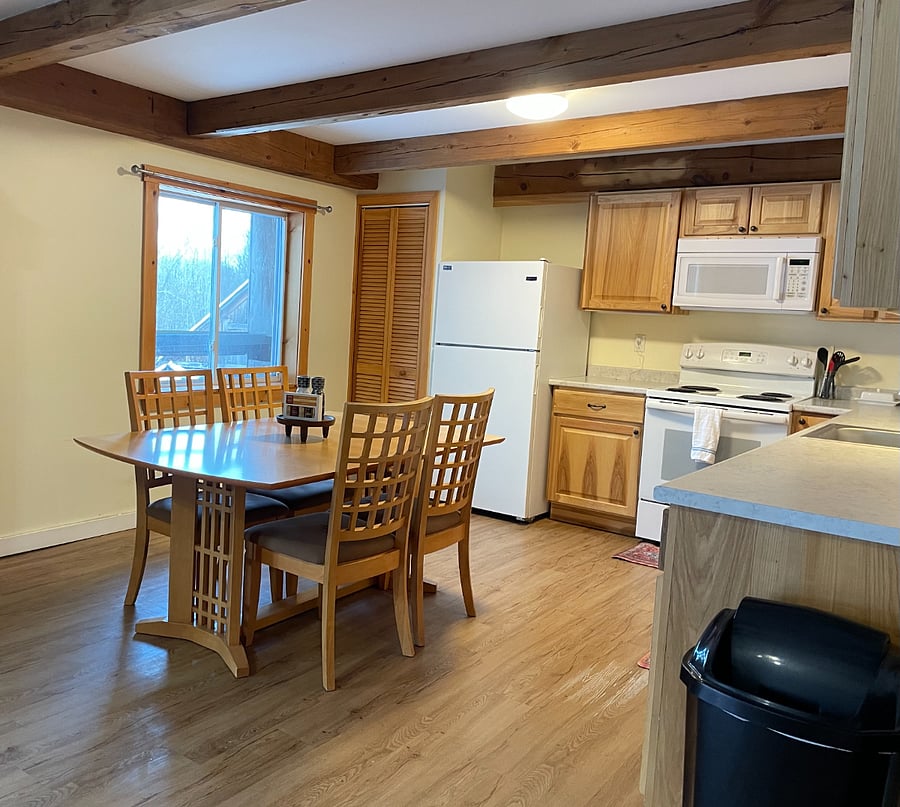 Fully applianced eat-in kitchen including dishwasher (not shown).