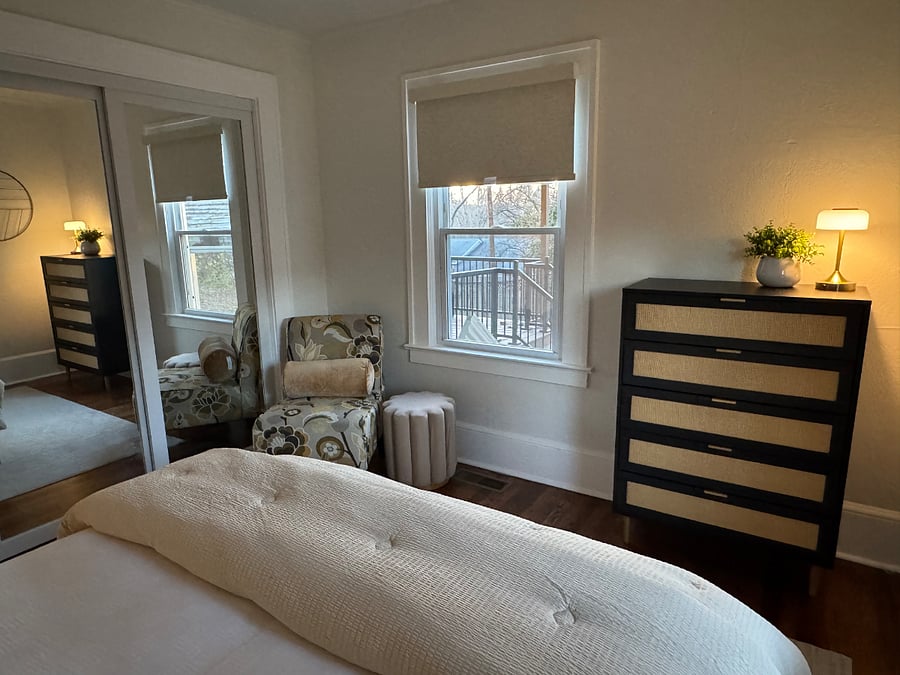 Bedroom 2 with Queen Bed, sitting area, TV on the way and large closet.