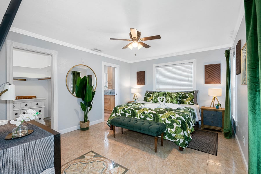 Master bedroom with a walk in closet