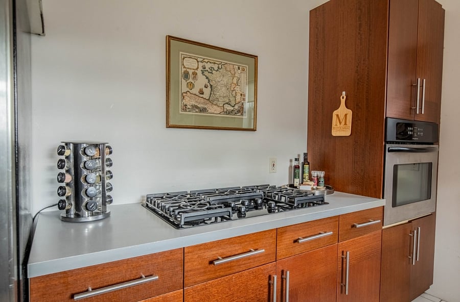 Five burner gas cooktop and self cleaning oven