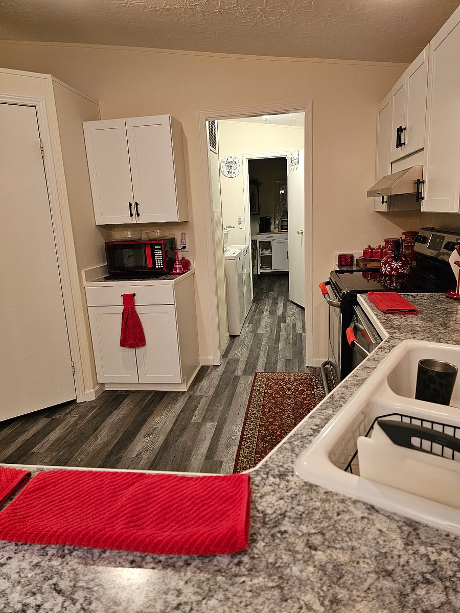 Garage entry is through the laundry room, to your Master Bathroom.