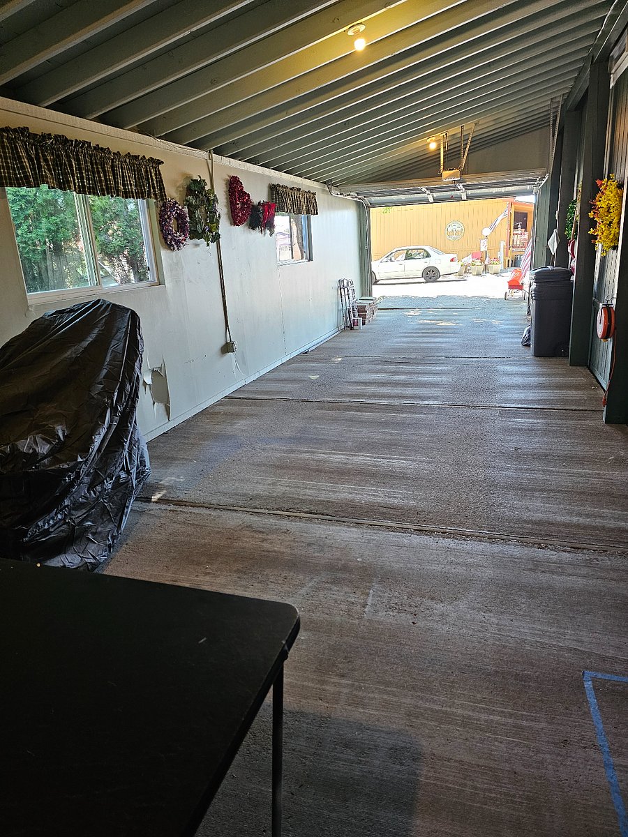 Tandem garage, with entry to laundry room.