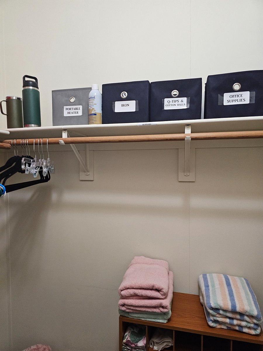 Walk-in closet with extra supplies, first-aide kit and other OTR medical supplies.