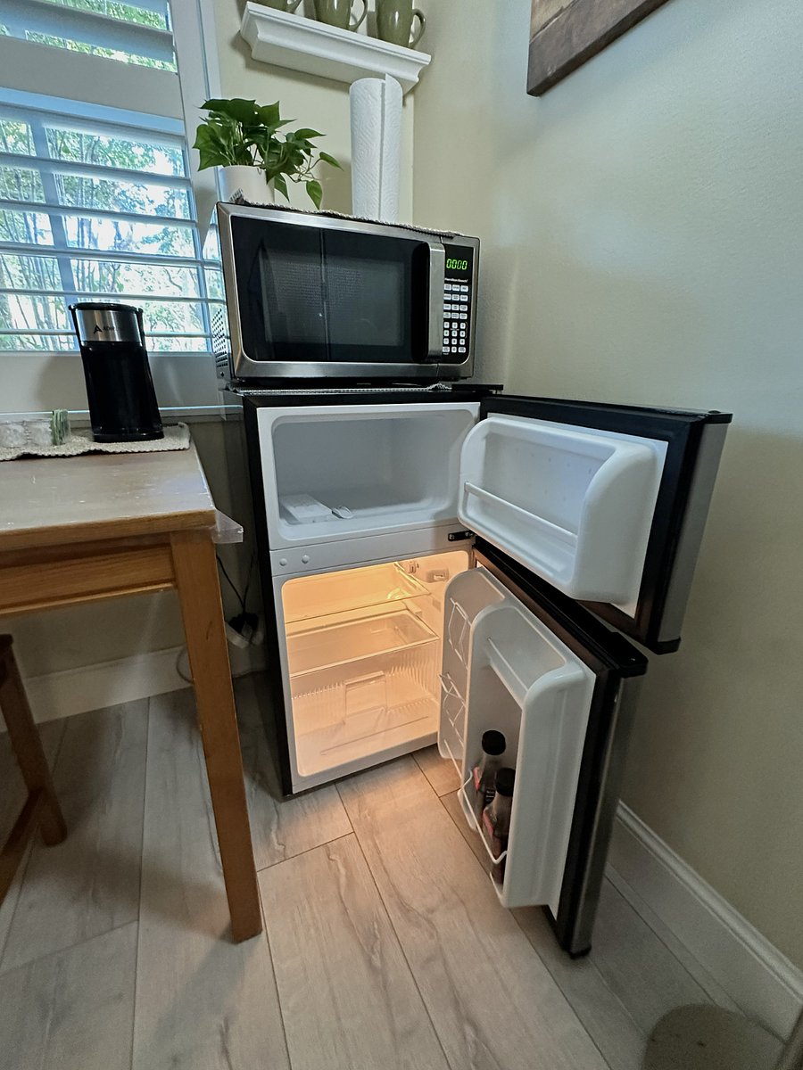 Mini refrigerator and microwave.