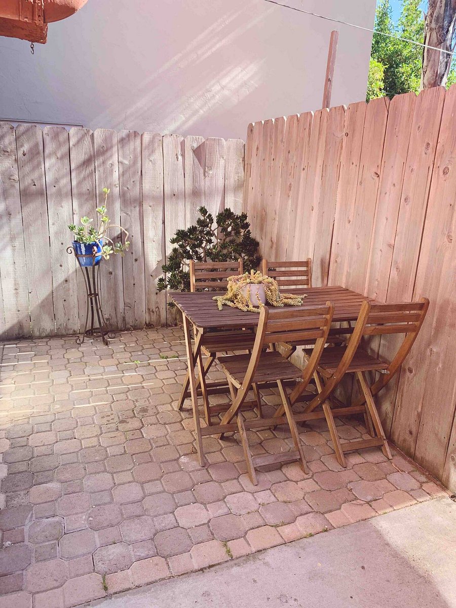 quiet small patio space behind gated area