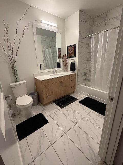 2nd Private Modern Full Bathroom with Beautiful Amenities of Large Vanity & Quartz Counter & Marble Tiles with a Rain Shower/Tub.