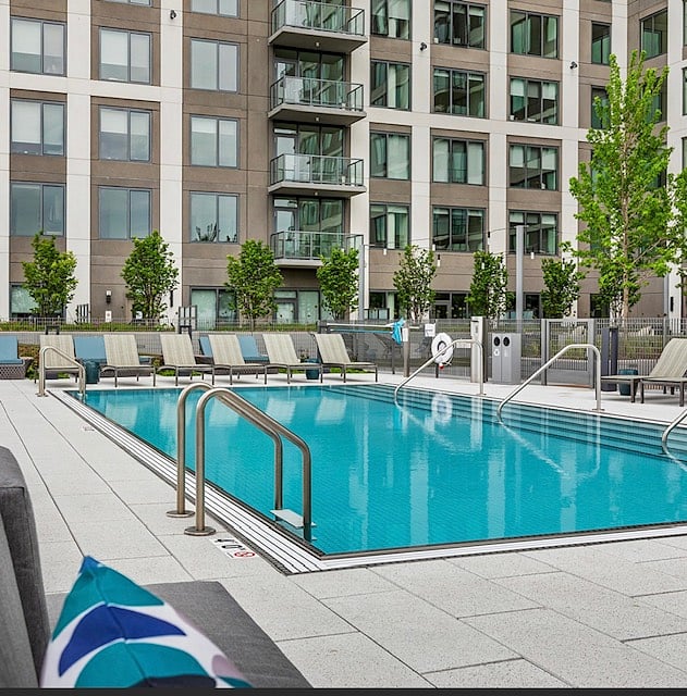 Outdoor Seasonal 4' deep Pool with Cabanas and Lounge Chairs on 5th Flr.
