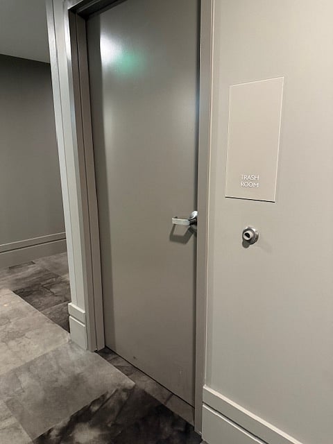 Trash Room conveniently located at the end of the Hallway from Unit 517
