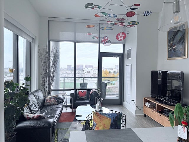 Corner Unit with 11.5 ft Ceilings and 2 Glass Doors to Private Terrace and Balcony.  Designer Mid-Century Modern Furnishings, Original Artwork & Large Screen TV