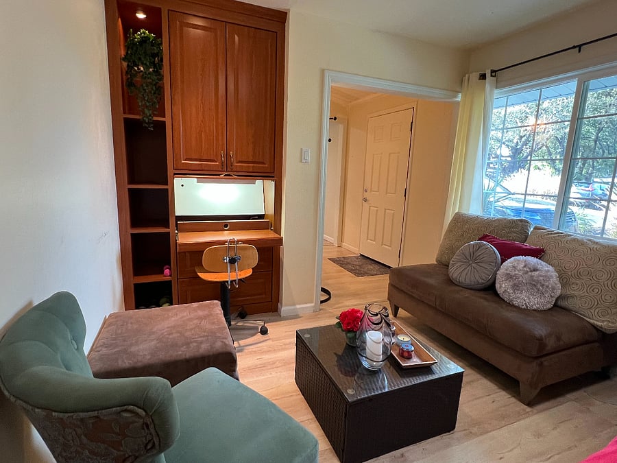 Coz sitting area. Laptop working station with lights, accessible outlet, shelves,drawers and closet