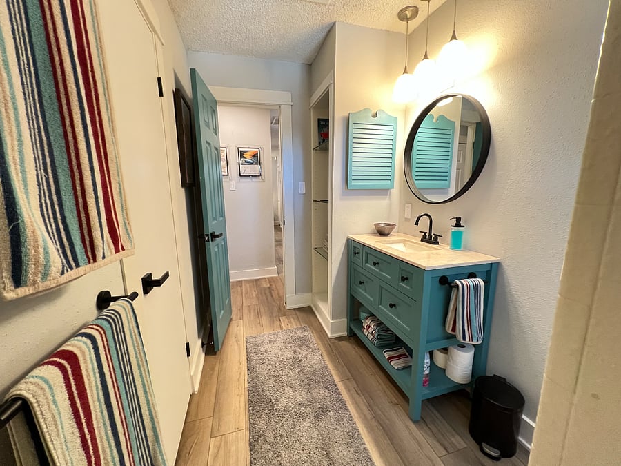 Hall Bathroom with extra towels and a full linen closet.