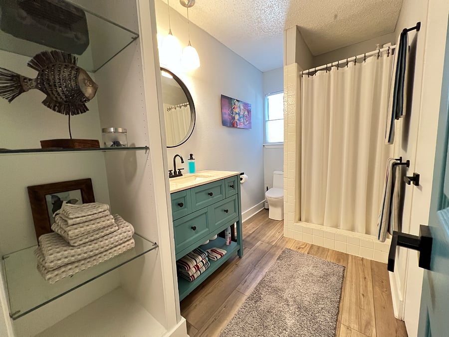 Hall Bathroom with extra towels and a full linen closet.