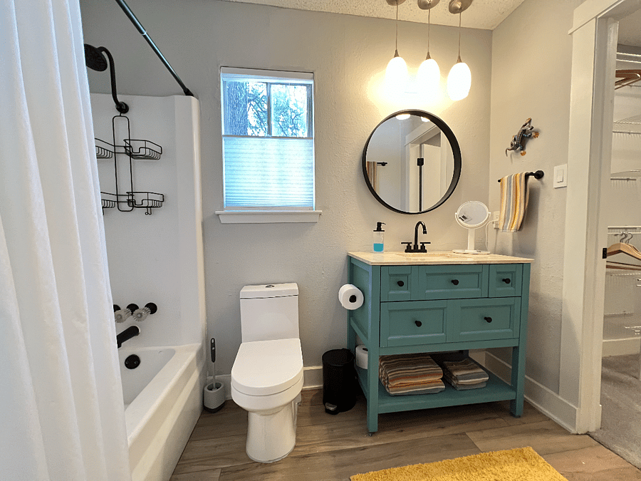 Master bath shown with direct access to the Master Coset
