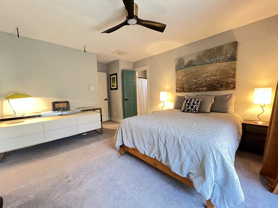 Master Bedroom - general view toward the inset entry door and Master Bath.