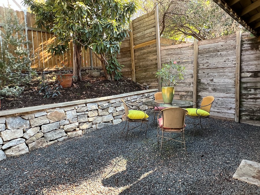 The terraced back yard has direct access from the Living Room and Master Bedroom as well as lovely evening lighting. It's a perfect space for small gatherings or pets.