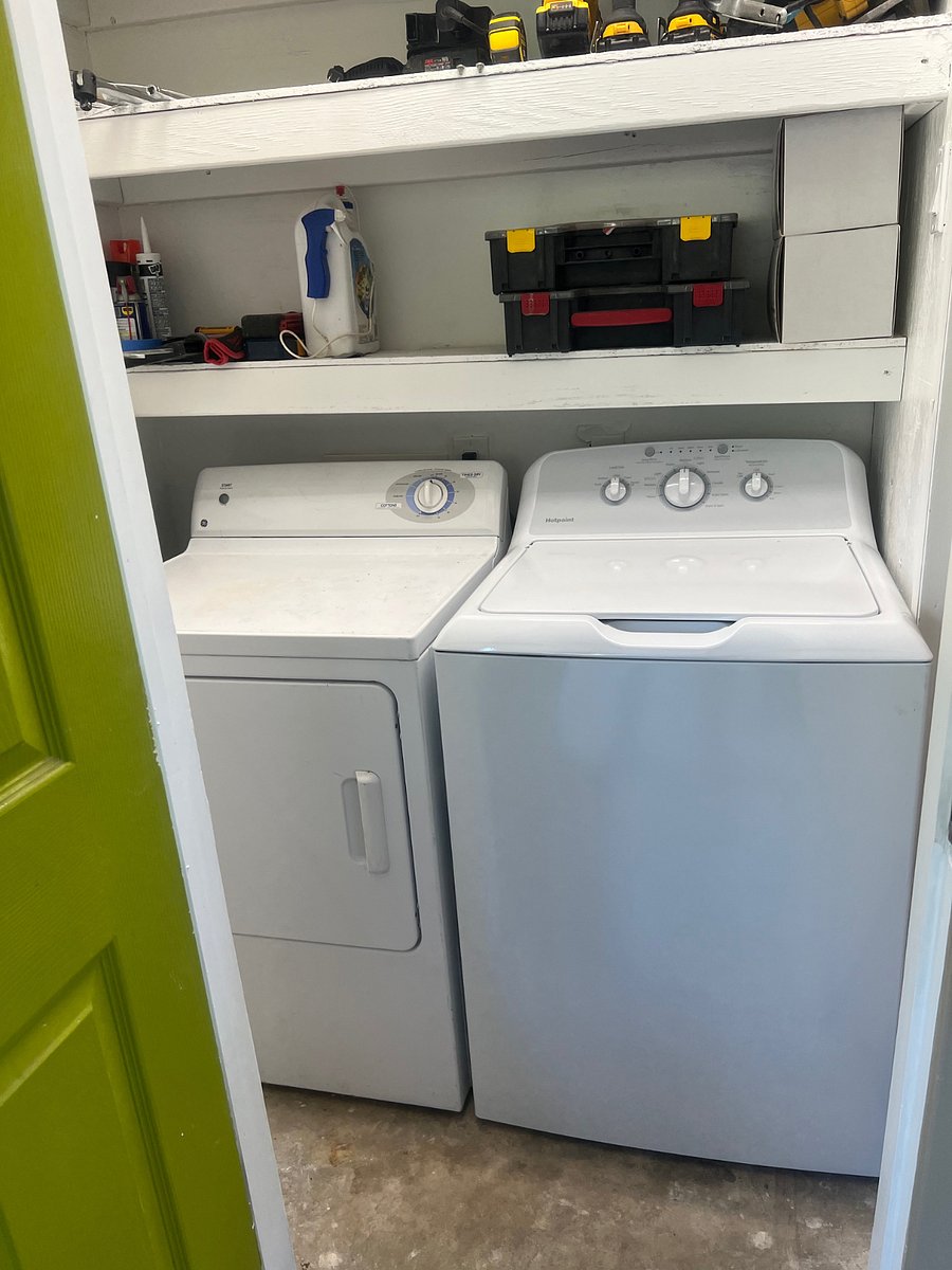 Laundry and Storage located in the Carport keeps the moisture and noise outside.