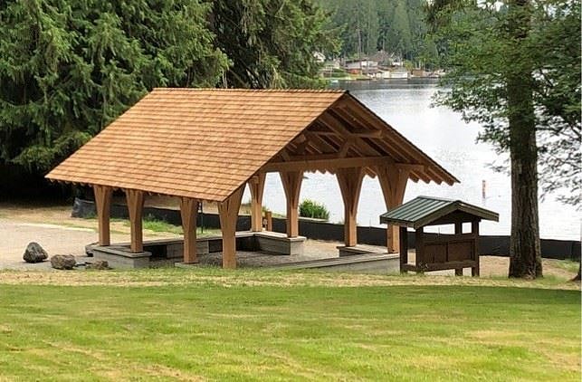 Impressive Timber Frame Picnic Shelter at the park across the lake & original homestead site of the Lake namesake.used wood pegs & no nails in it's construction.