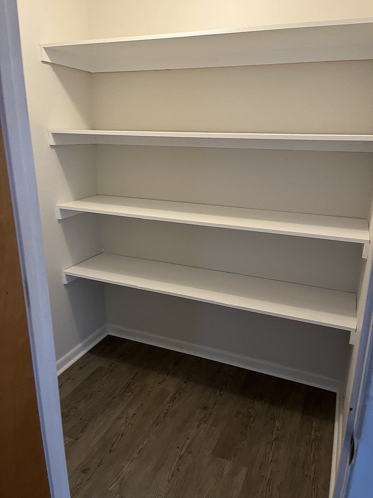 Large walk-in pantry near kitchen and dining area.