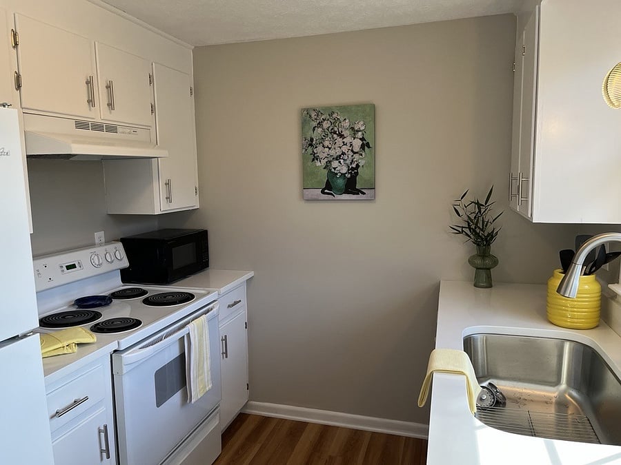 Galley kitchen. All kitchen basics included.