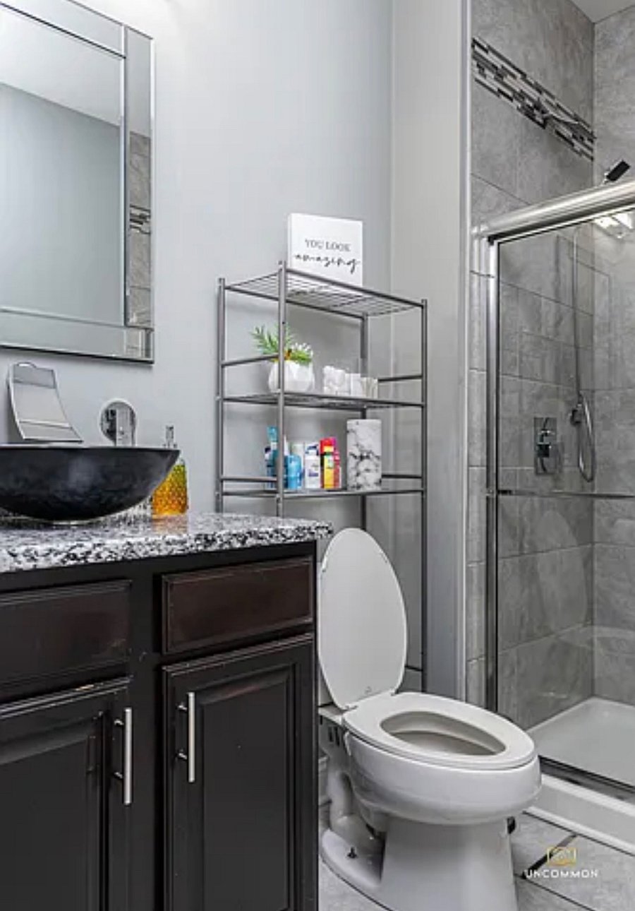 Downstairs bathroom with walk-in shower. 