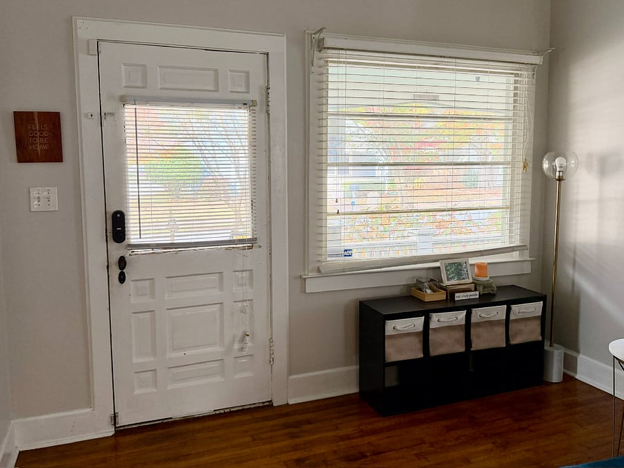 Entry way with storage for shoes and a dish for pocket items.
