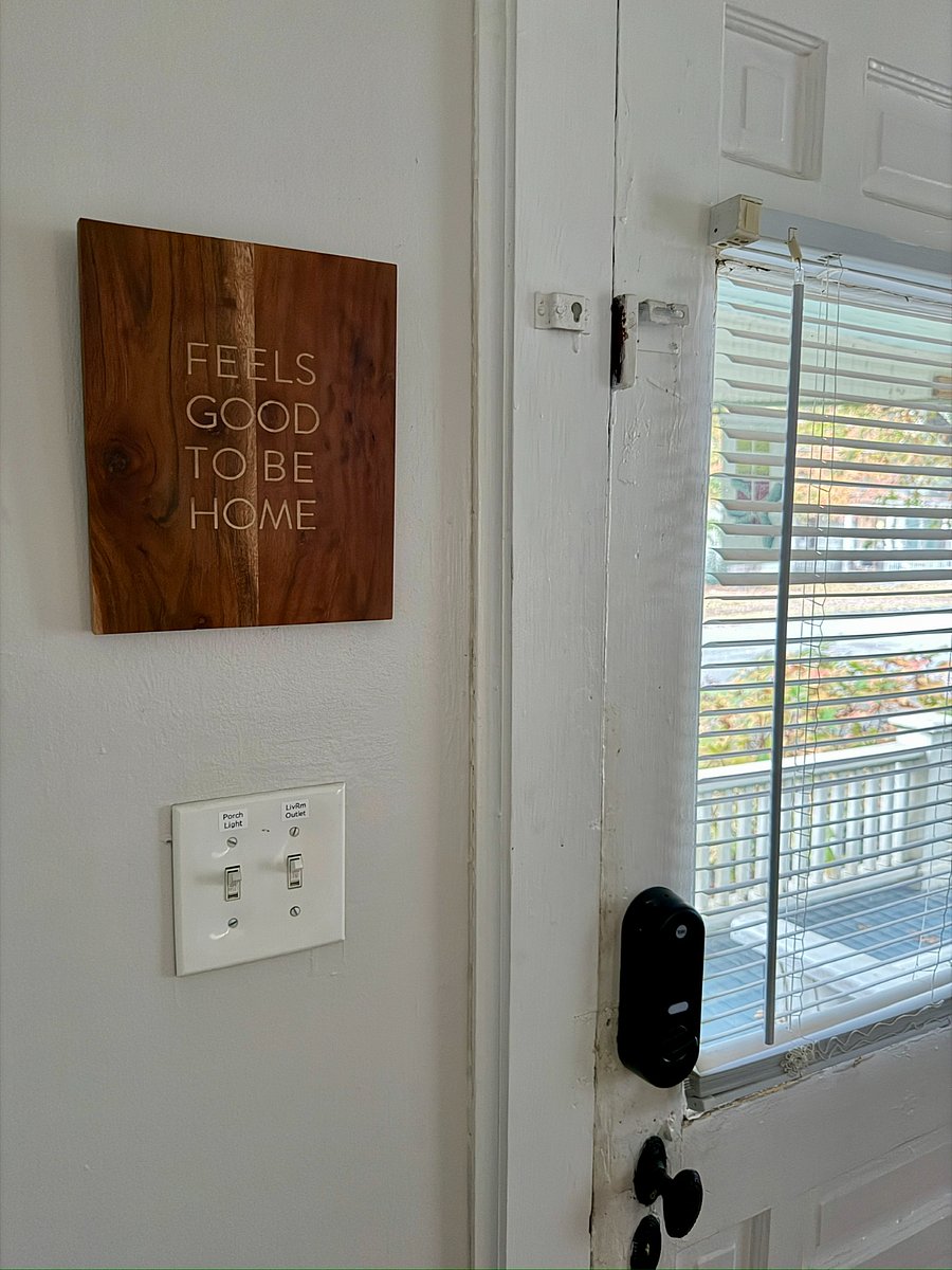 Interior view of door with Yale dead bolt lock that locks/unlocks door.