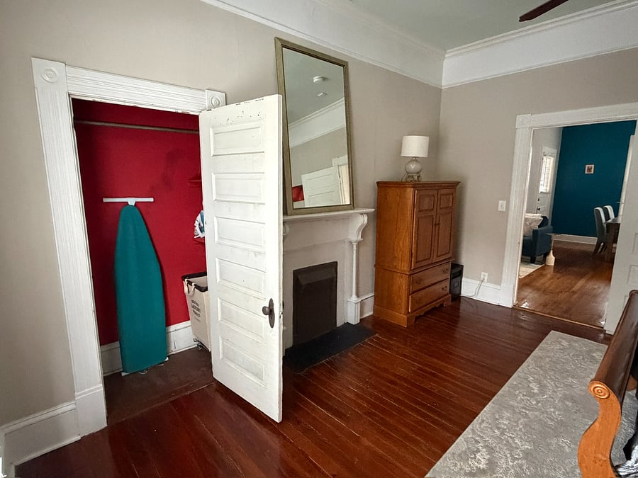 Closet space with door open.