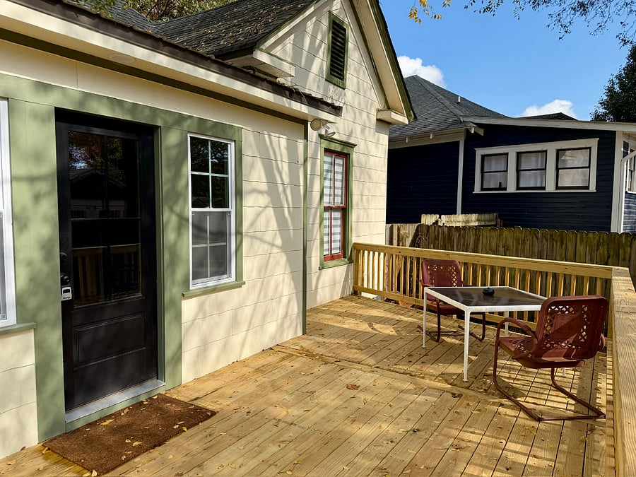 New backyard deck with seating area.