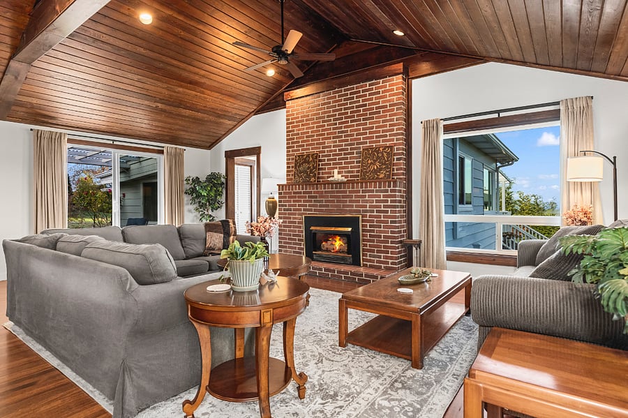 The floor to ceiling vintage brick hearth draws everyone to this space and is the heart and soul of the room! The vaulted hardwood open beam ceiling adds warmth and depth. The big room is everybodys favorite!