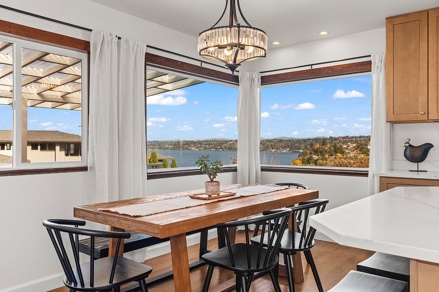 Enjoy the dining area with view of the water through the over-sized windows