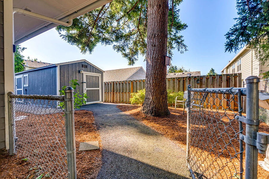 Private fenced backyard, (Shed not included)