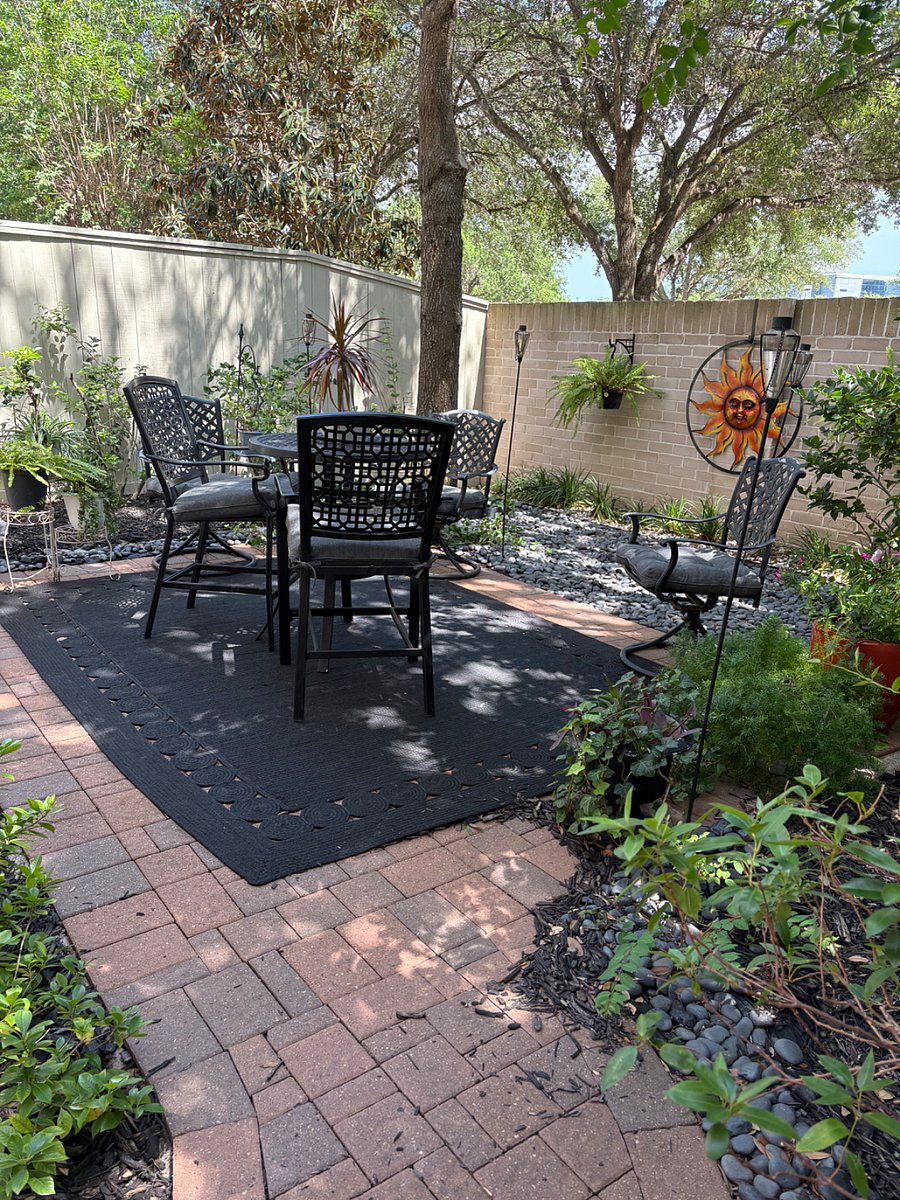 Access to backyard zen rock garden from bedroom private back door.