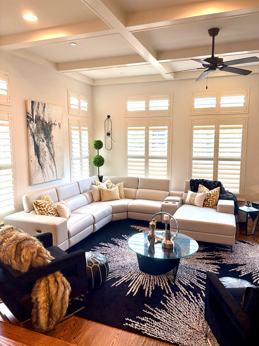 Spacious living room with surrounding windows, fireplace and smart TV on second floor