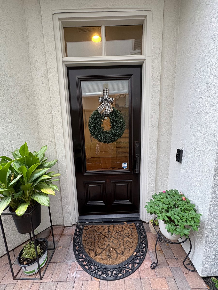 Front door entrance with security video doorbell