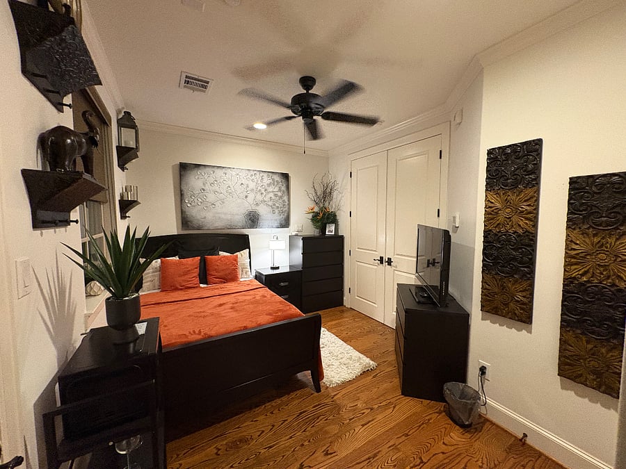 View #2 of private bedroom with Smart TV, free WiFi, personal thermostat and private entrance and exit door to backyard garden on first floor