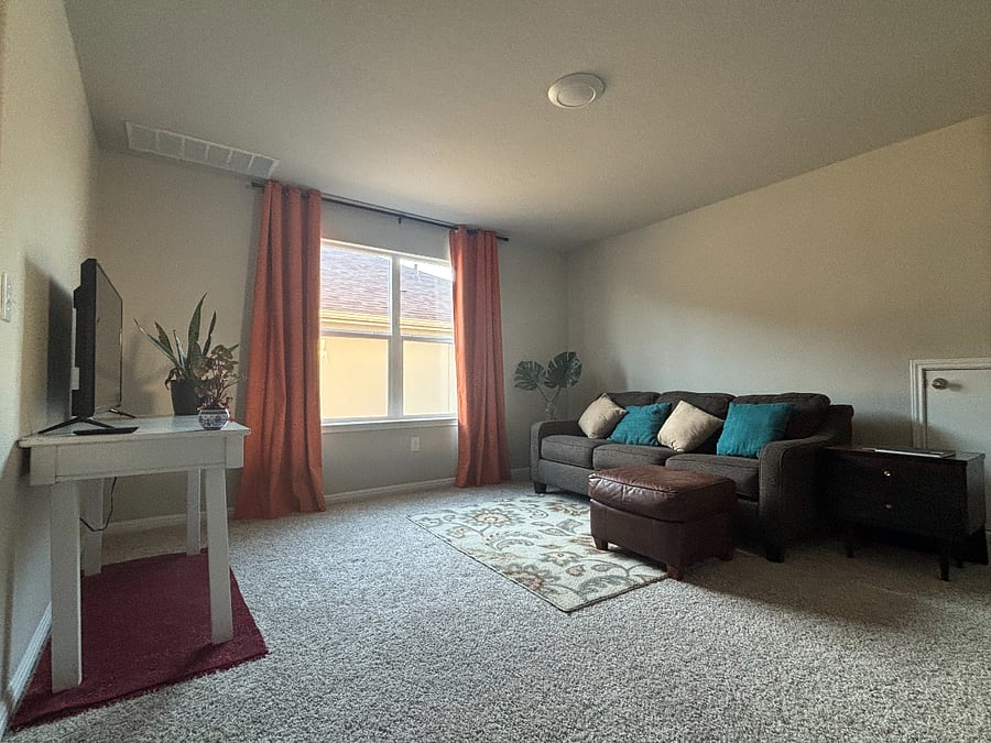 Upstairs loft space is yours to do what you please. 13 x 14ft. Make it your greenhouse, yoga studio, office or creative space! This is a pull out couch with a memory foam mattress.