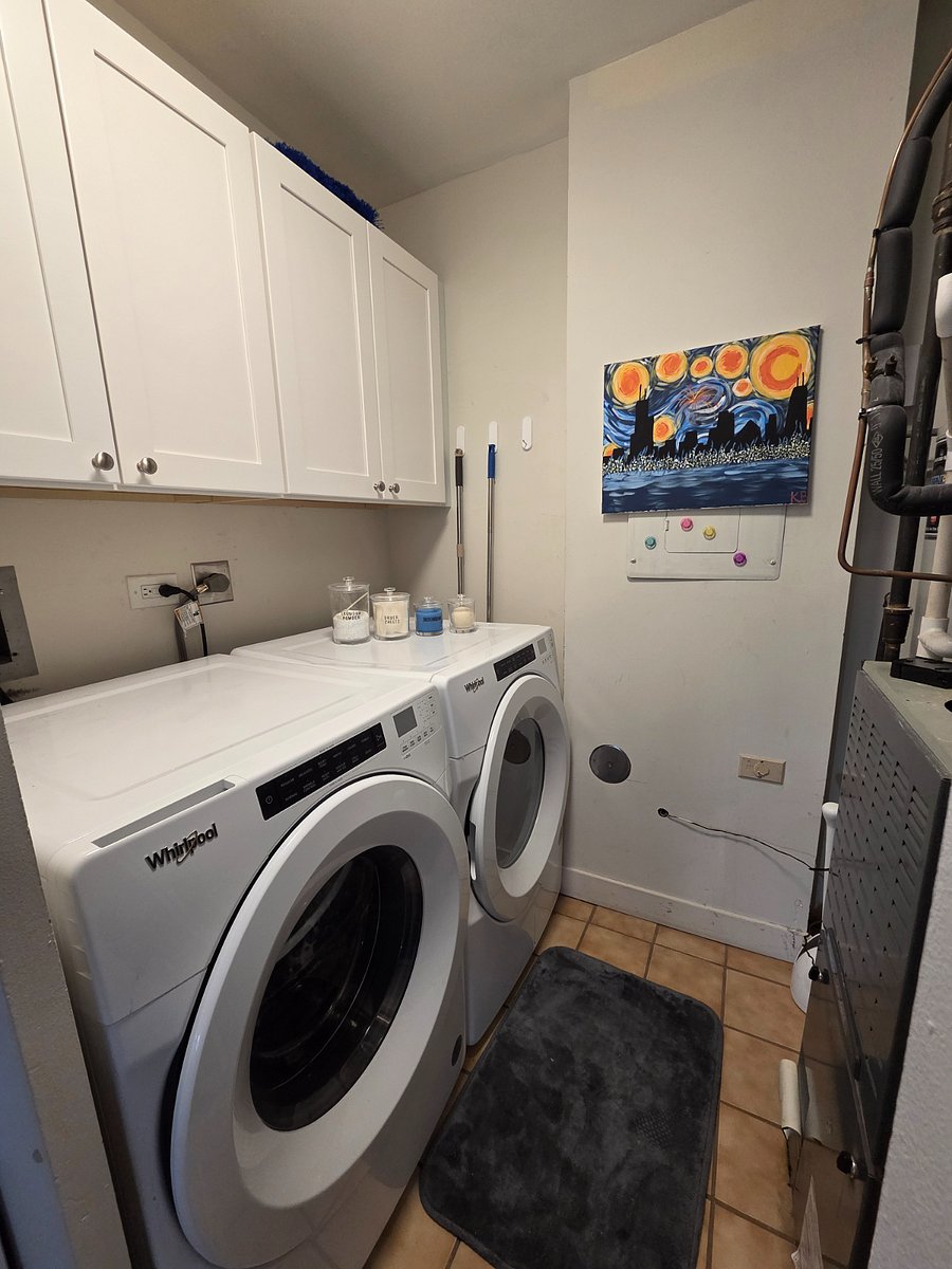 washer and dryer off kitchen
